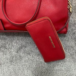 Michael Kors red wallet matches the hamilton bag